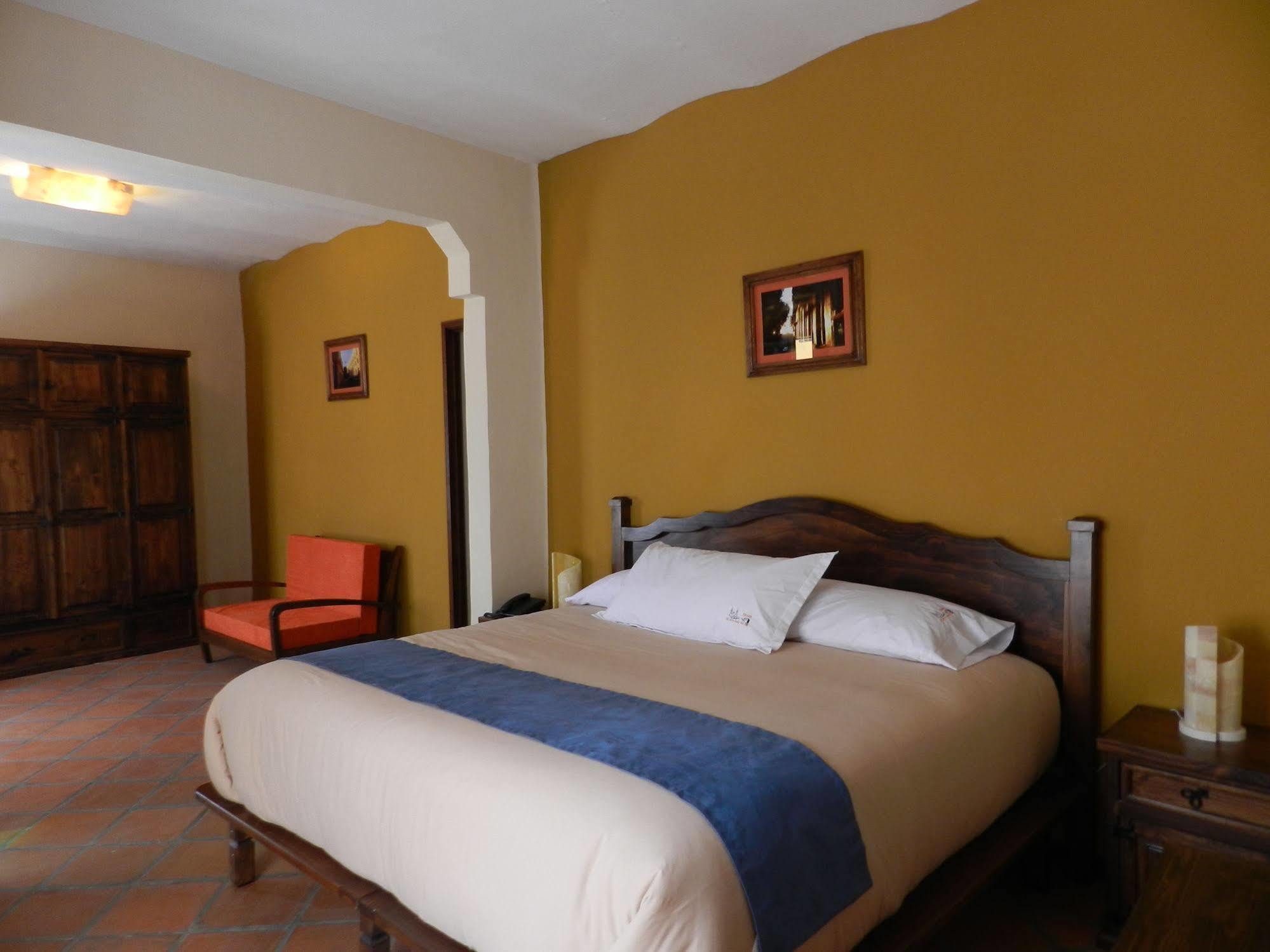 Collection O Al Otro Lado Del Rio, Puebla Ξενοδοχείο Εξωτερικό φωτογραφία A bedroom at the hotel