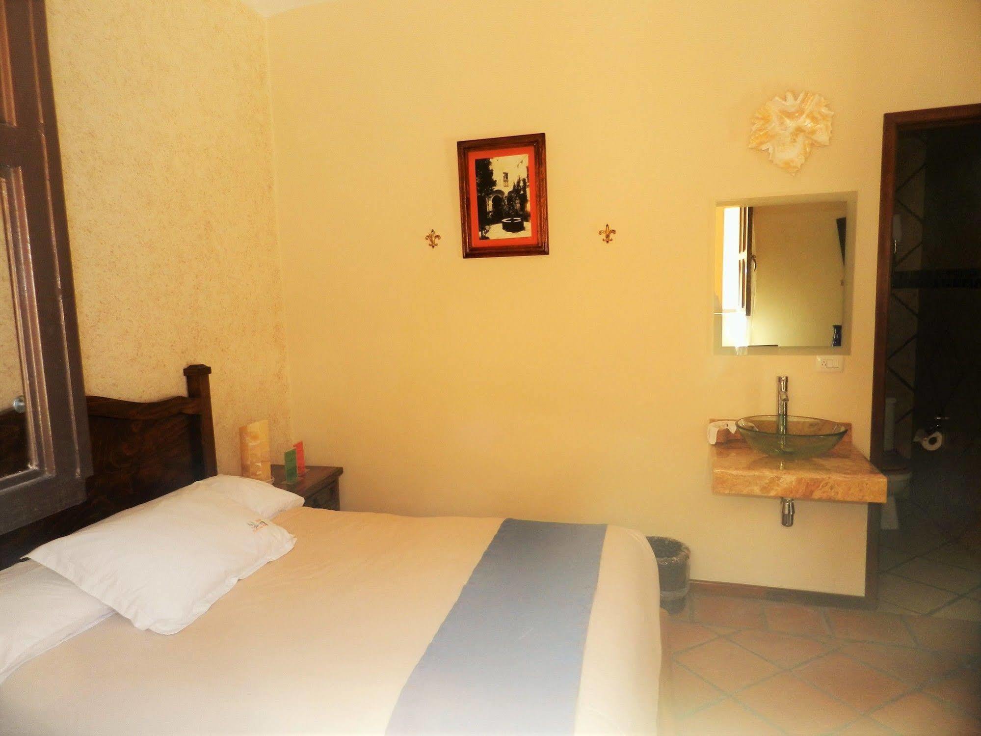 Collection O Al Otro Lado Del Rio, Puebla Ξενοδοχείο Εξωτερικό φωτογραφία A room at the hotel